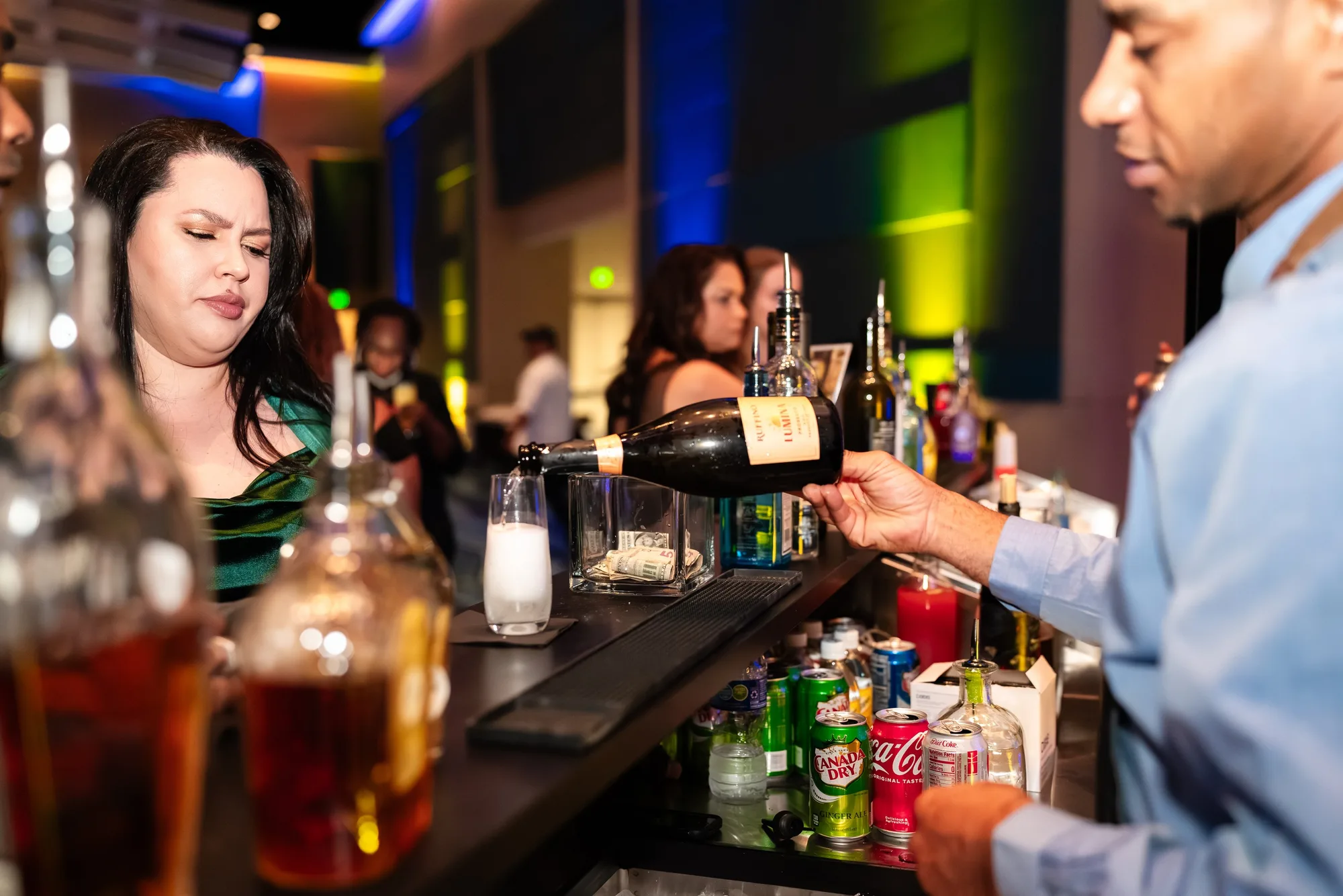 Bartender pouring at a gala bar