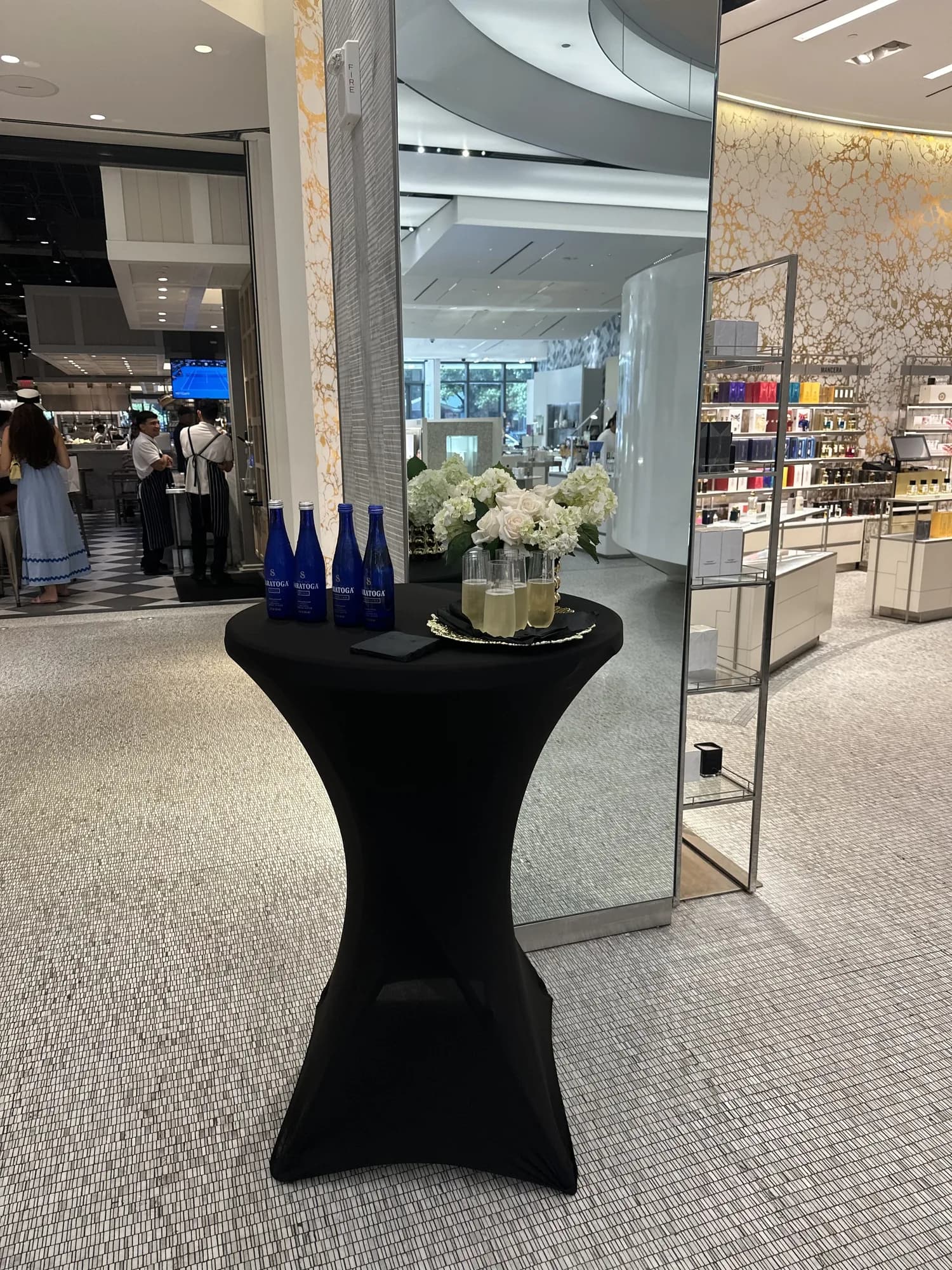 Cocktail table setup in a corporate lobby