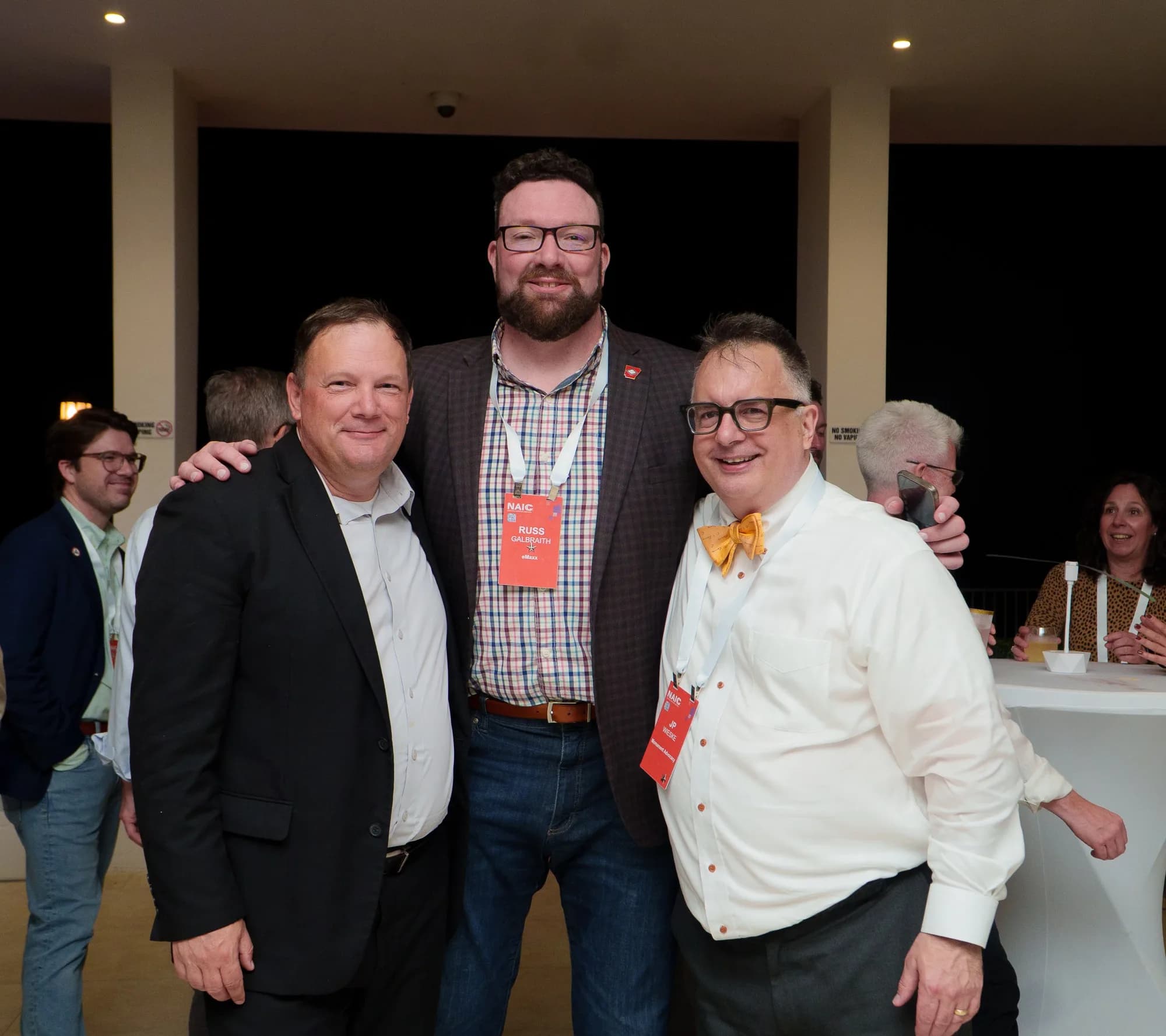 Corporate event attendees with badges