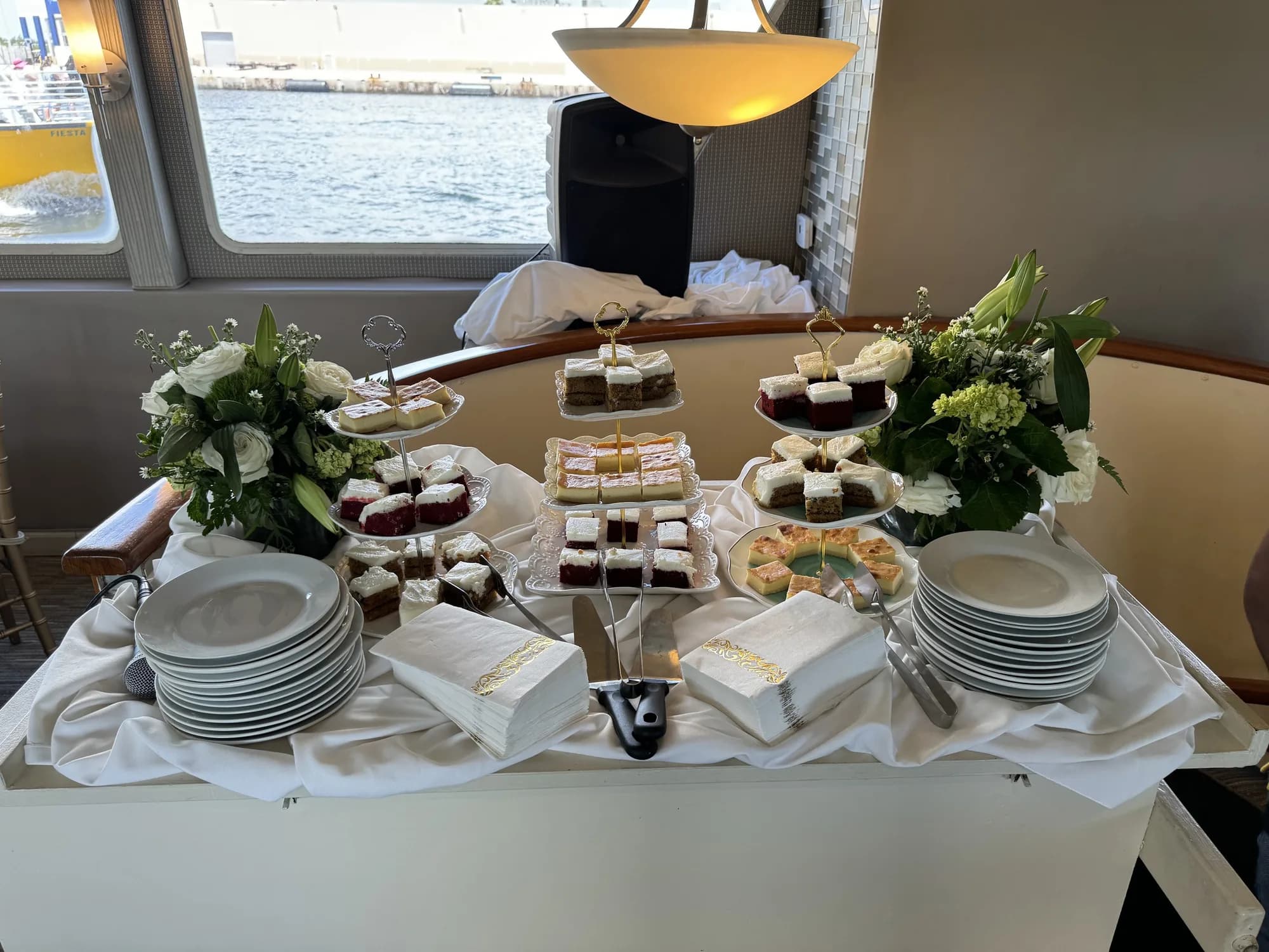 Dessert plates and florals on a display table