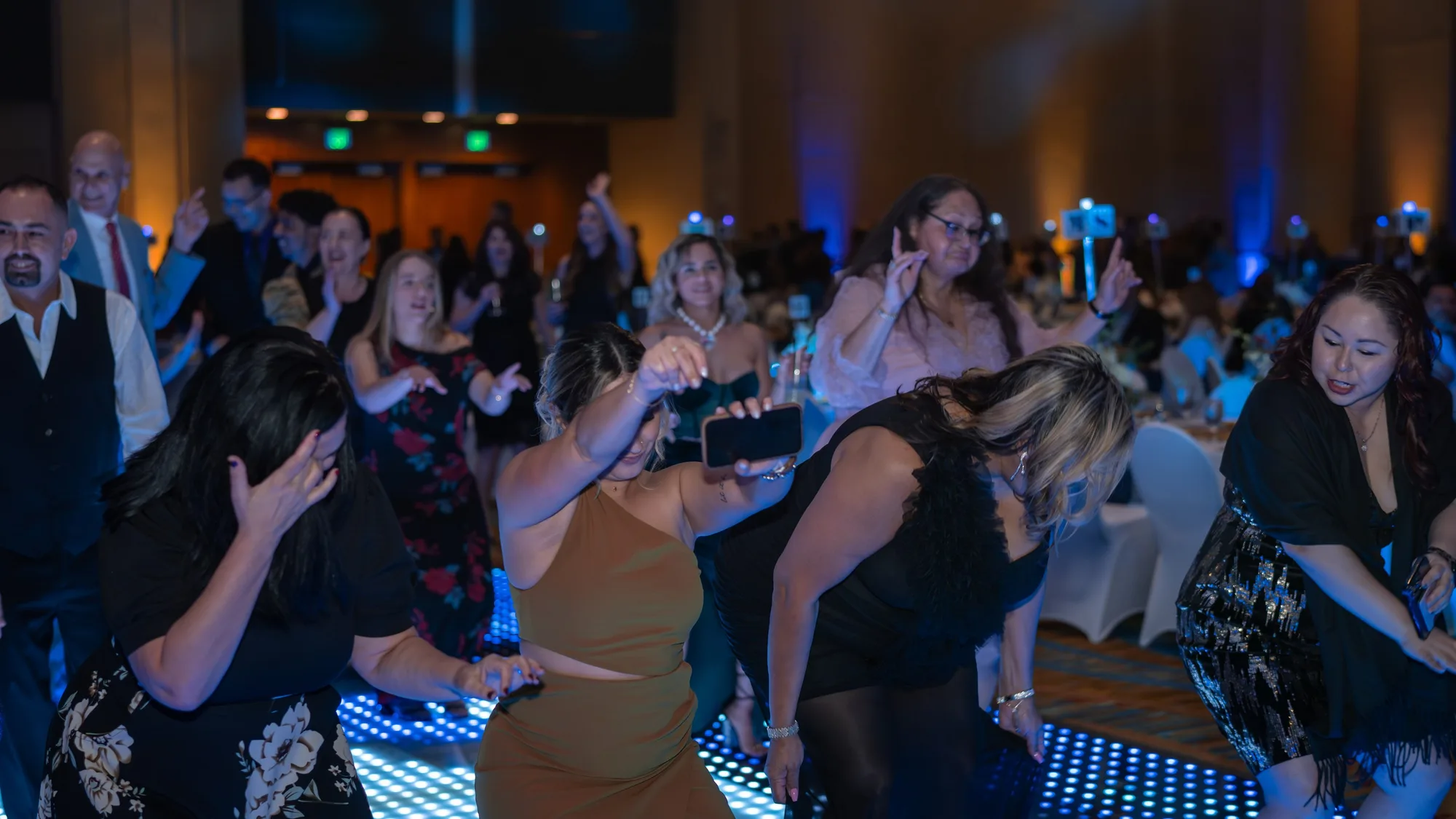 Guests celebrating on the dance floor