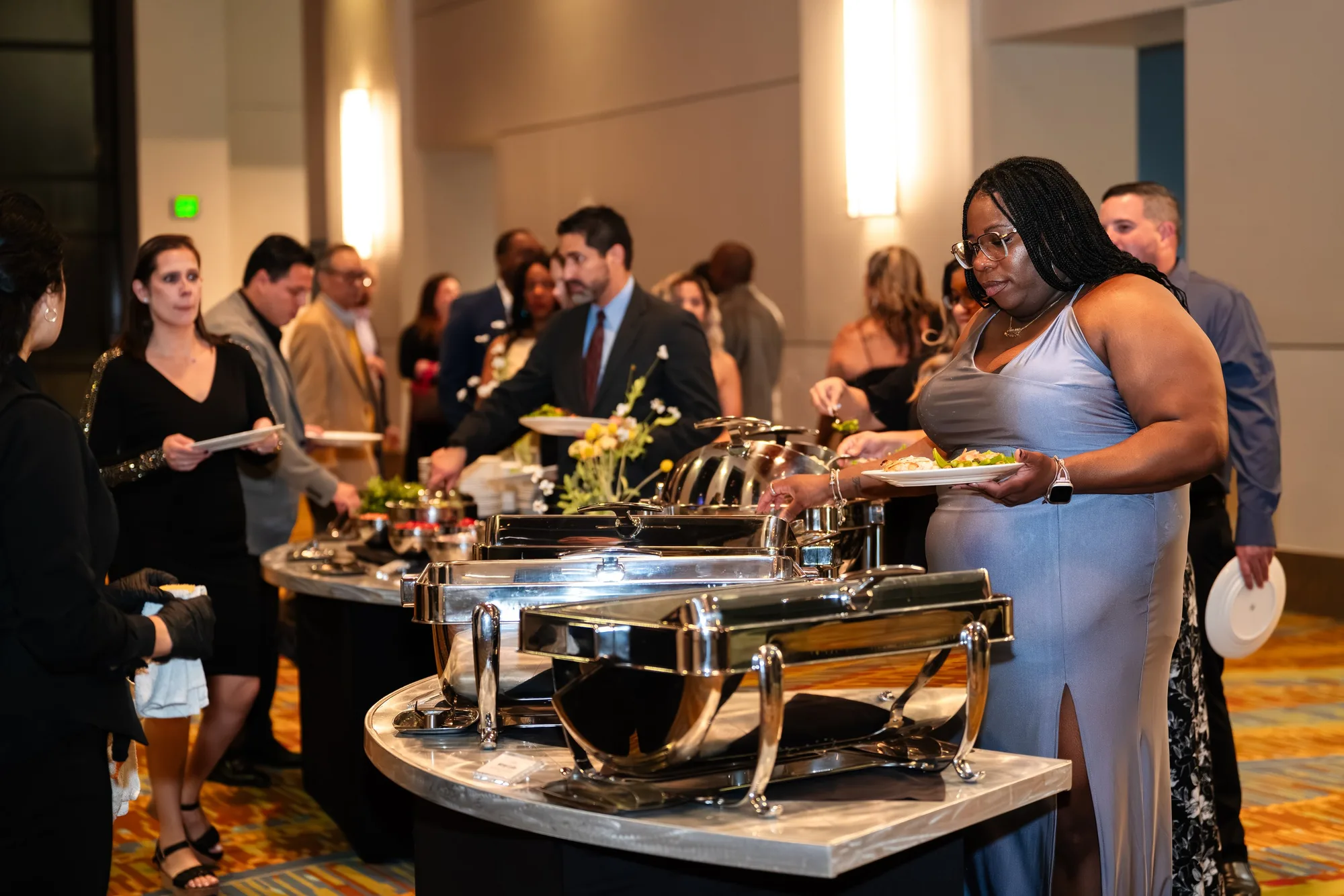 Guests at a gala buffet