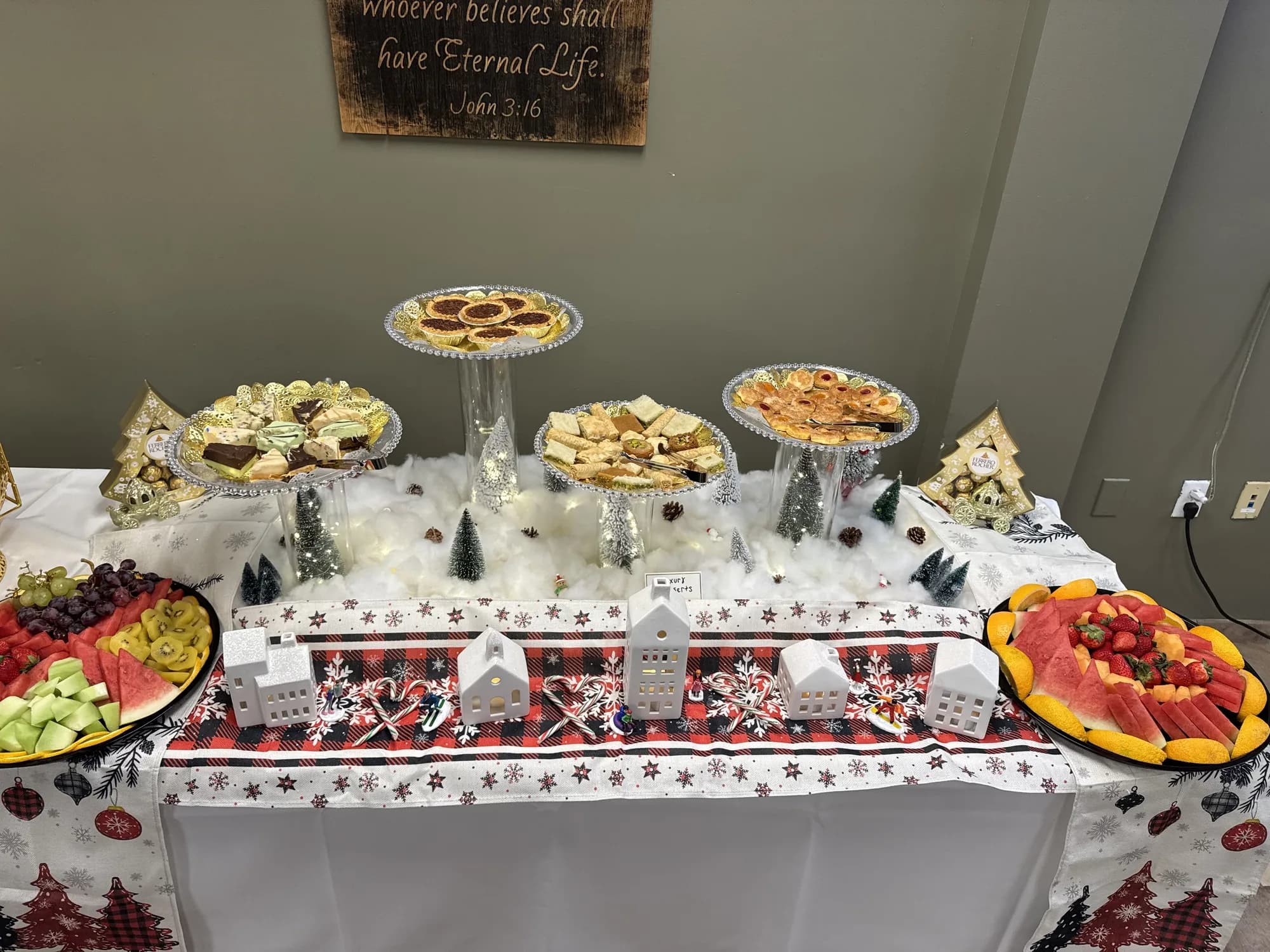 Holiday dessert and appetizer table with themed linens