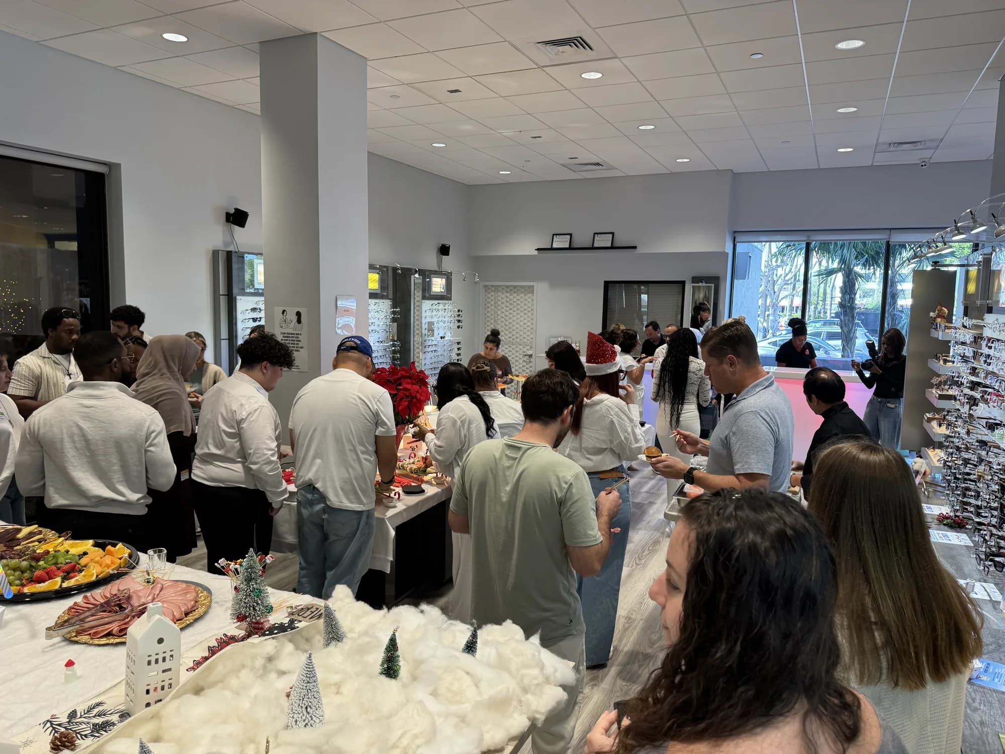 Guests at a corporate holiday party buffet