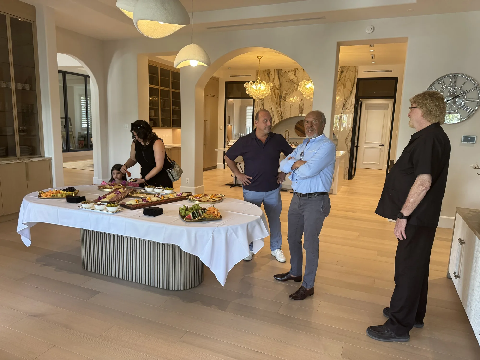 Guests at a catered buffet in a private home