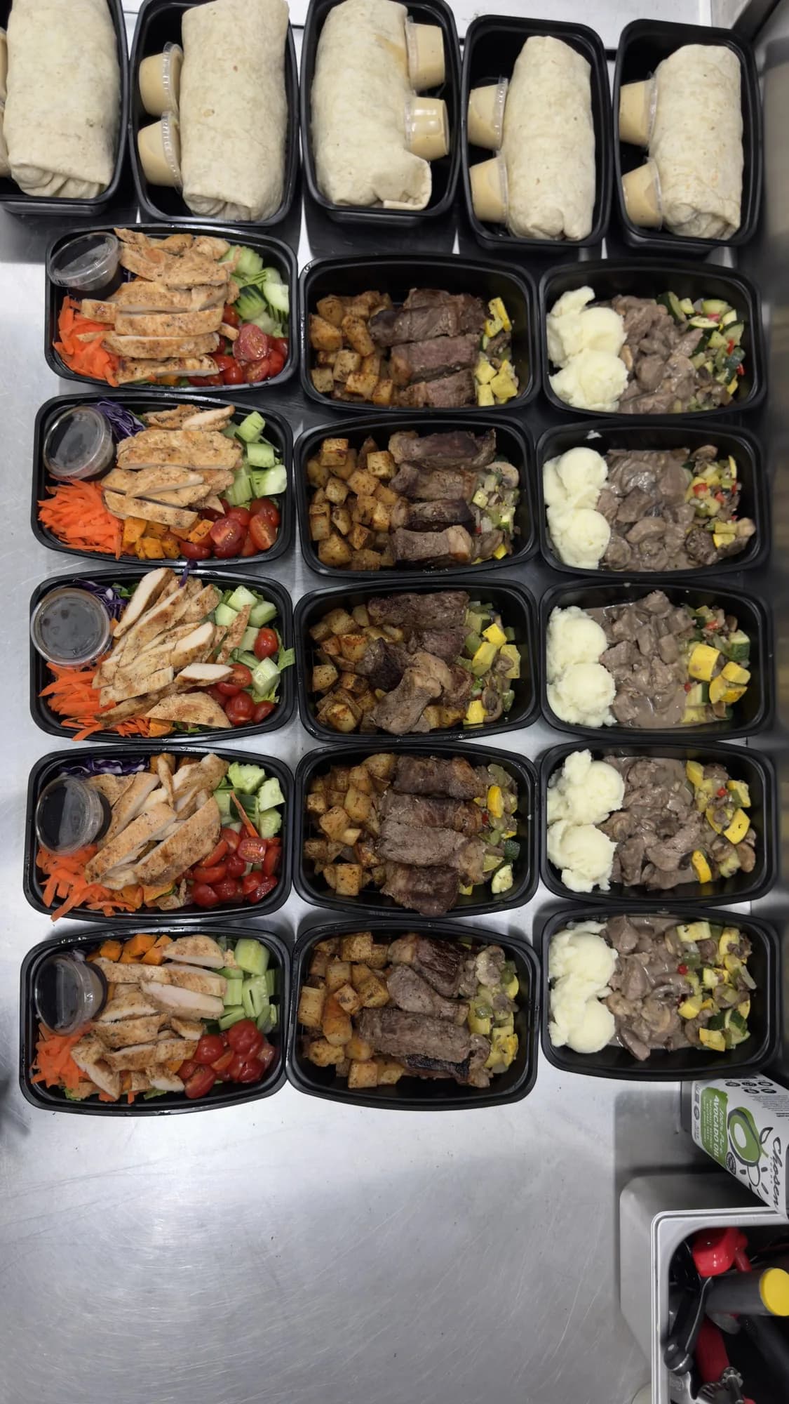 Weekly meal prep containers lined up in the kitchen
