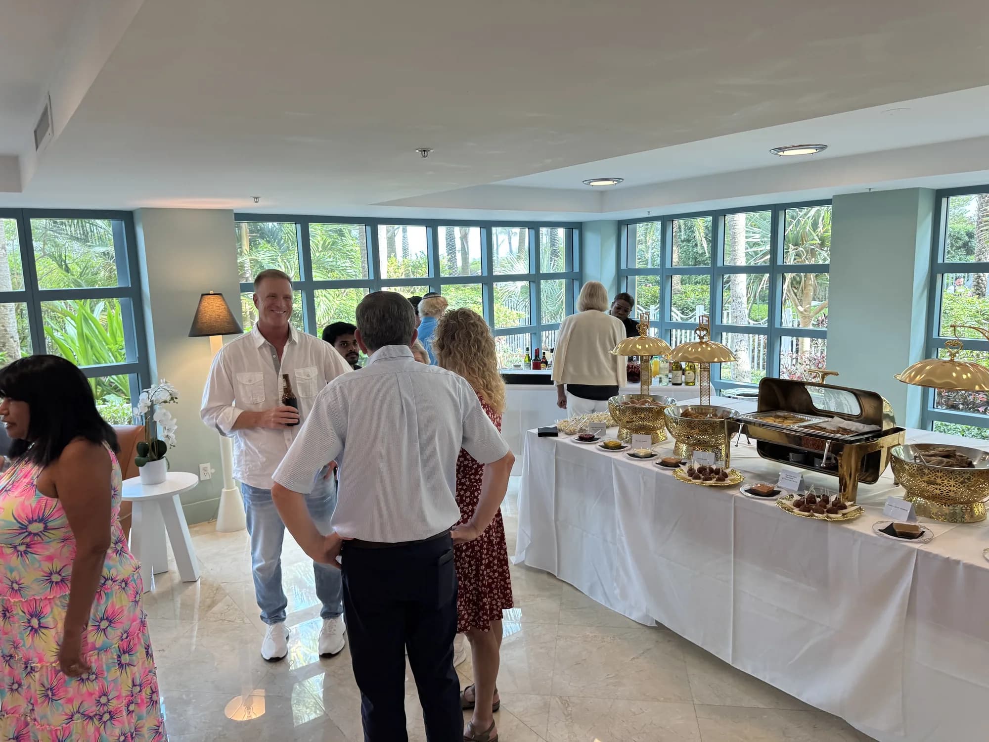 Buffet tables at a bright mixer venue