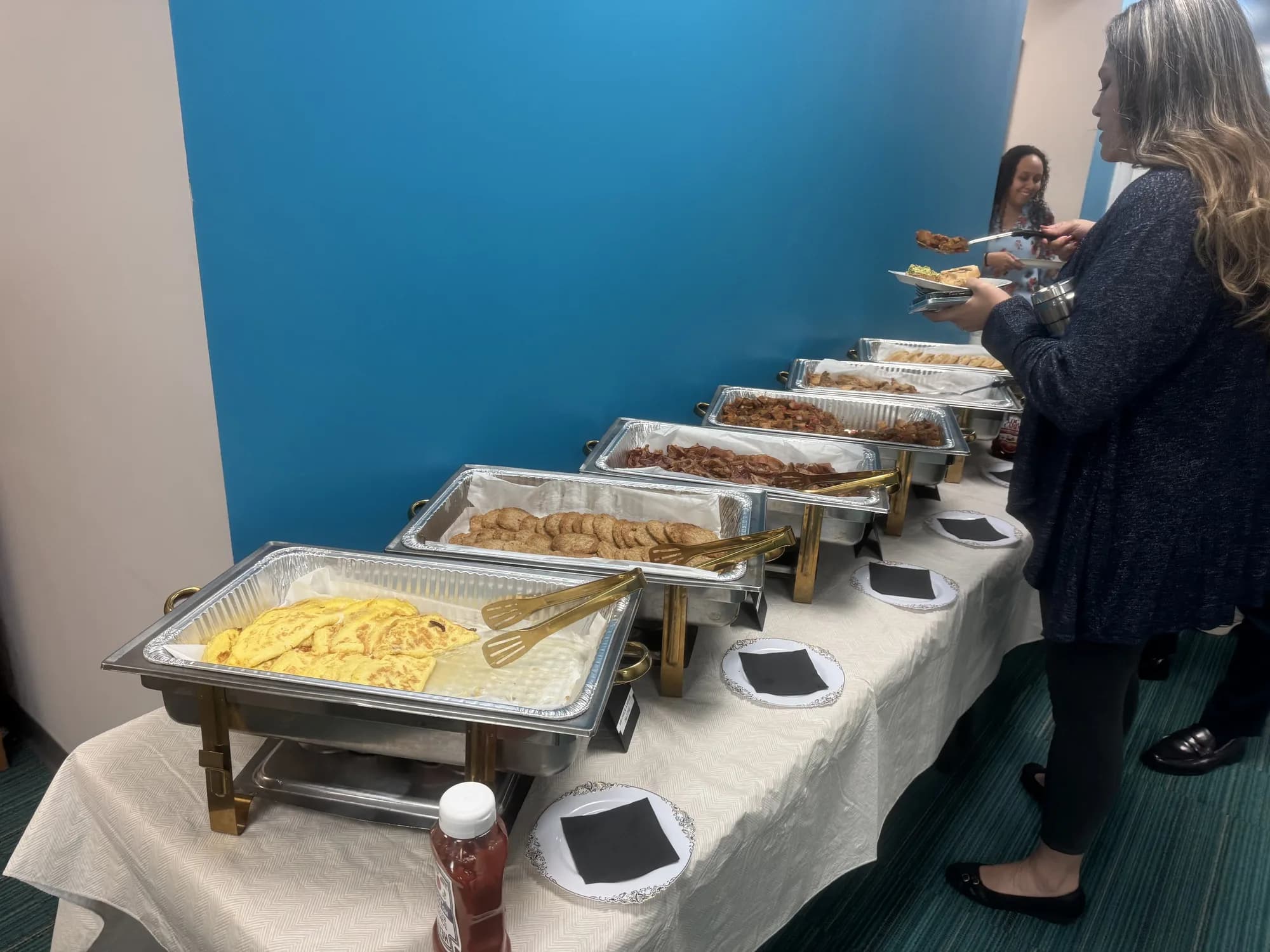 Office buffet line with chafing dishes for a corporate catering order