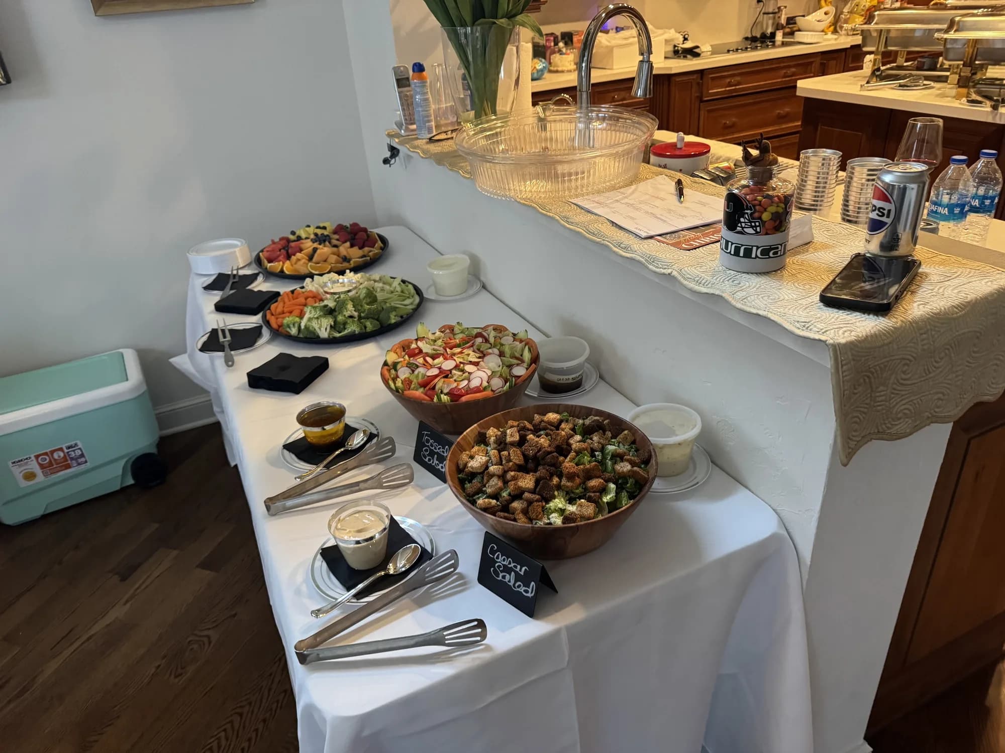 Catering platters set out in an office kitchen