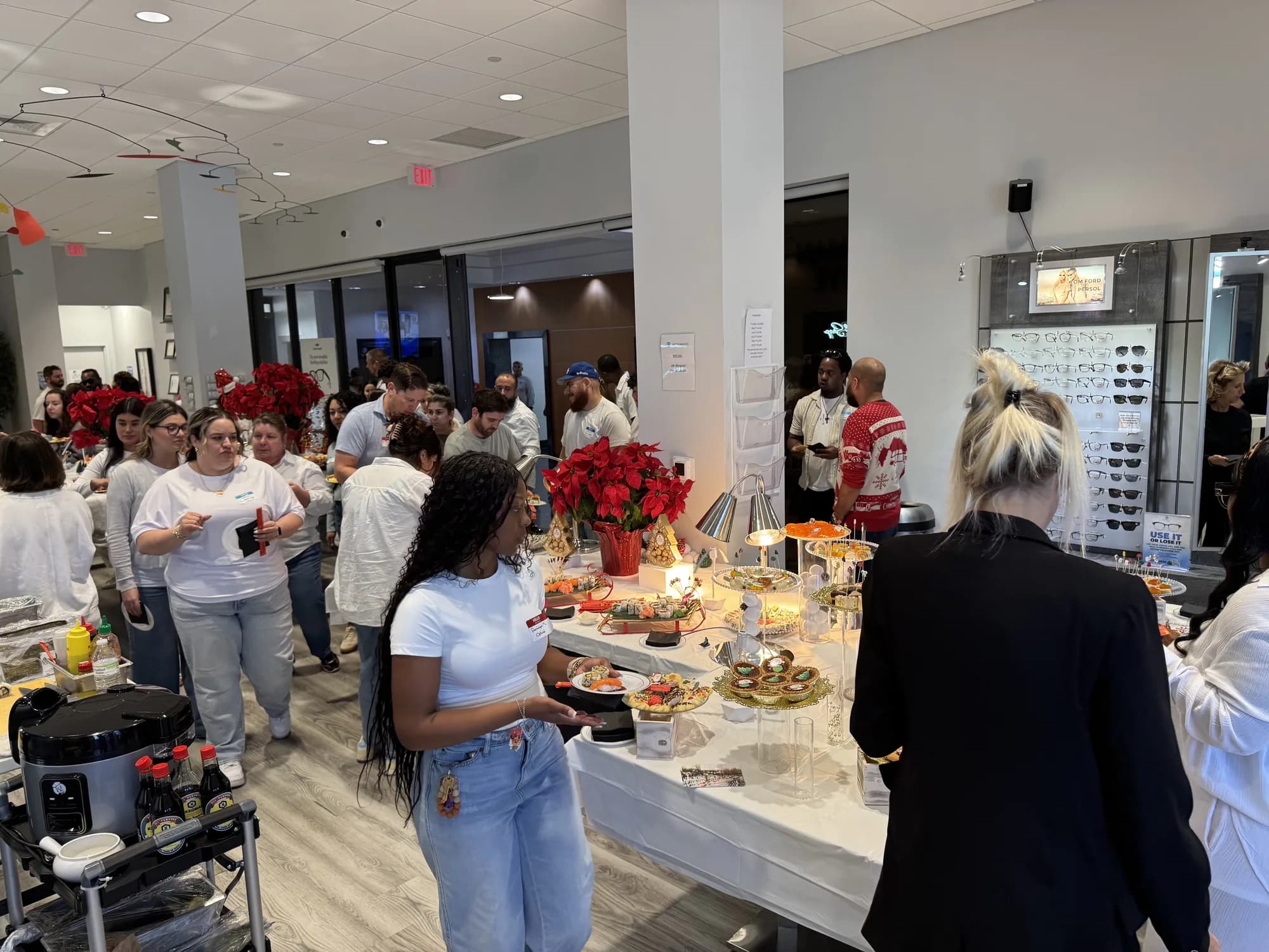 Guests at a catered buffet in a showroom