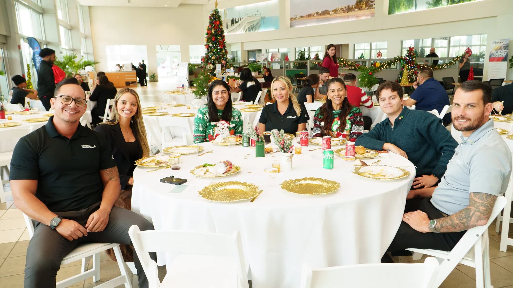Team seated at a round table at a catered company event