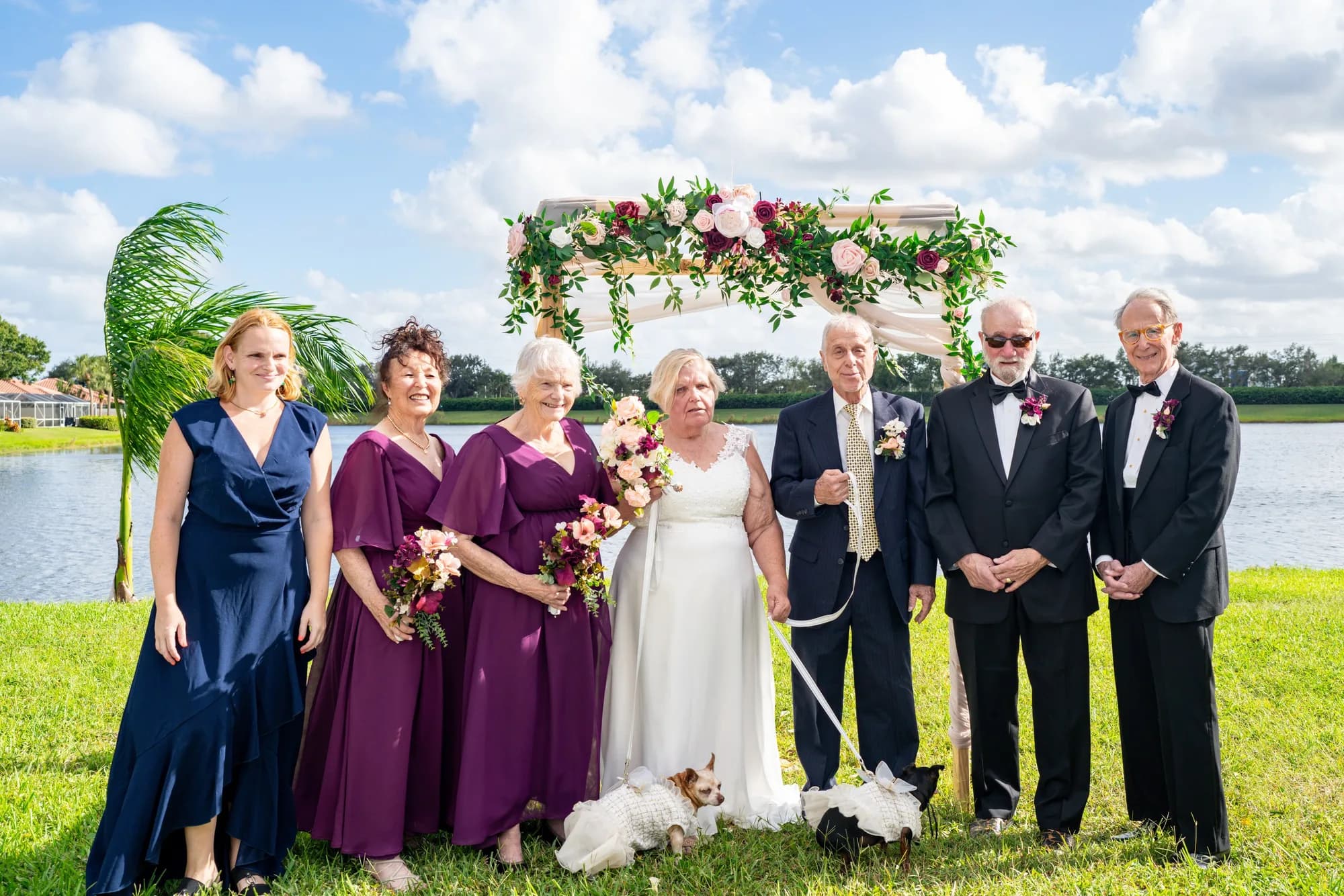 Wedding party portrait by the lake